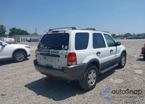 2003 Ford Escape Xlt z USA, uszkodzony, nr VIN 1FMYU031X3KE08408